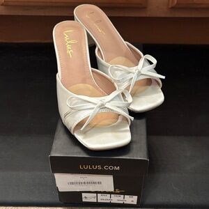 Lulu's White Bow Slip-Ons